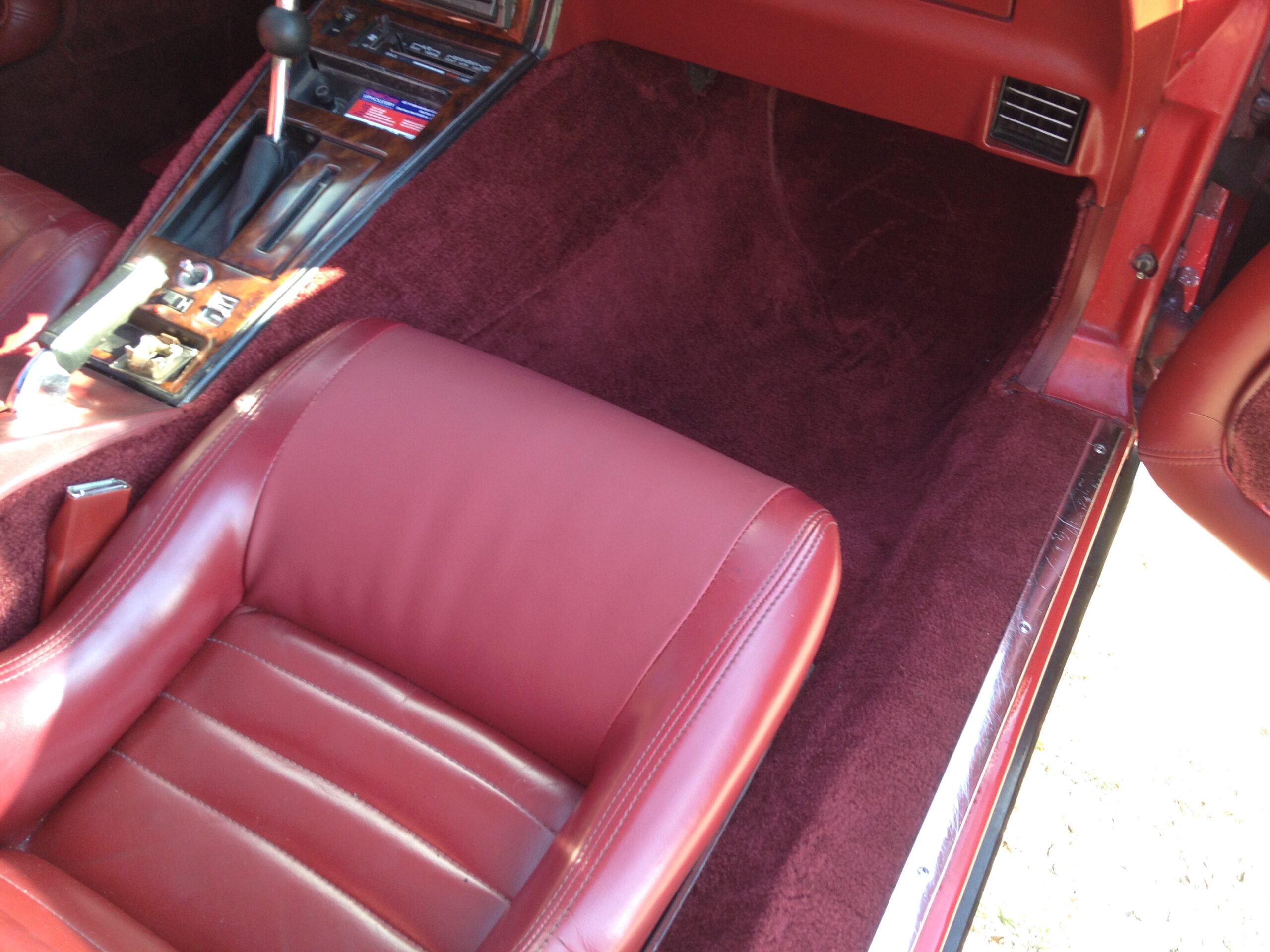 Premier auto carpet installation by Chair Care Upholstery.