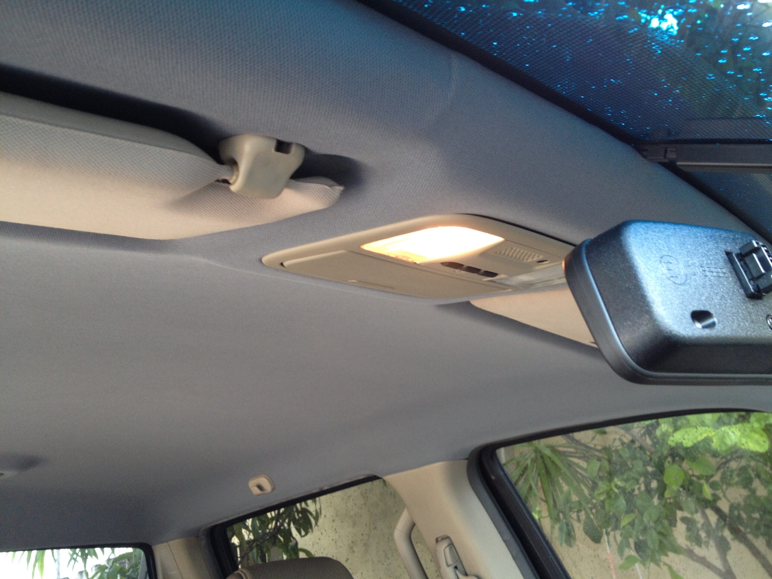 Headliner repair by Chair Care Upholstery in Hollywood, Florida