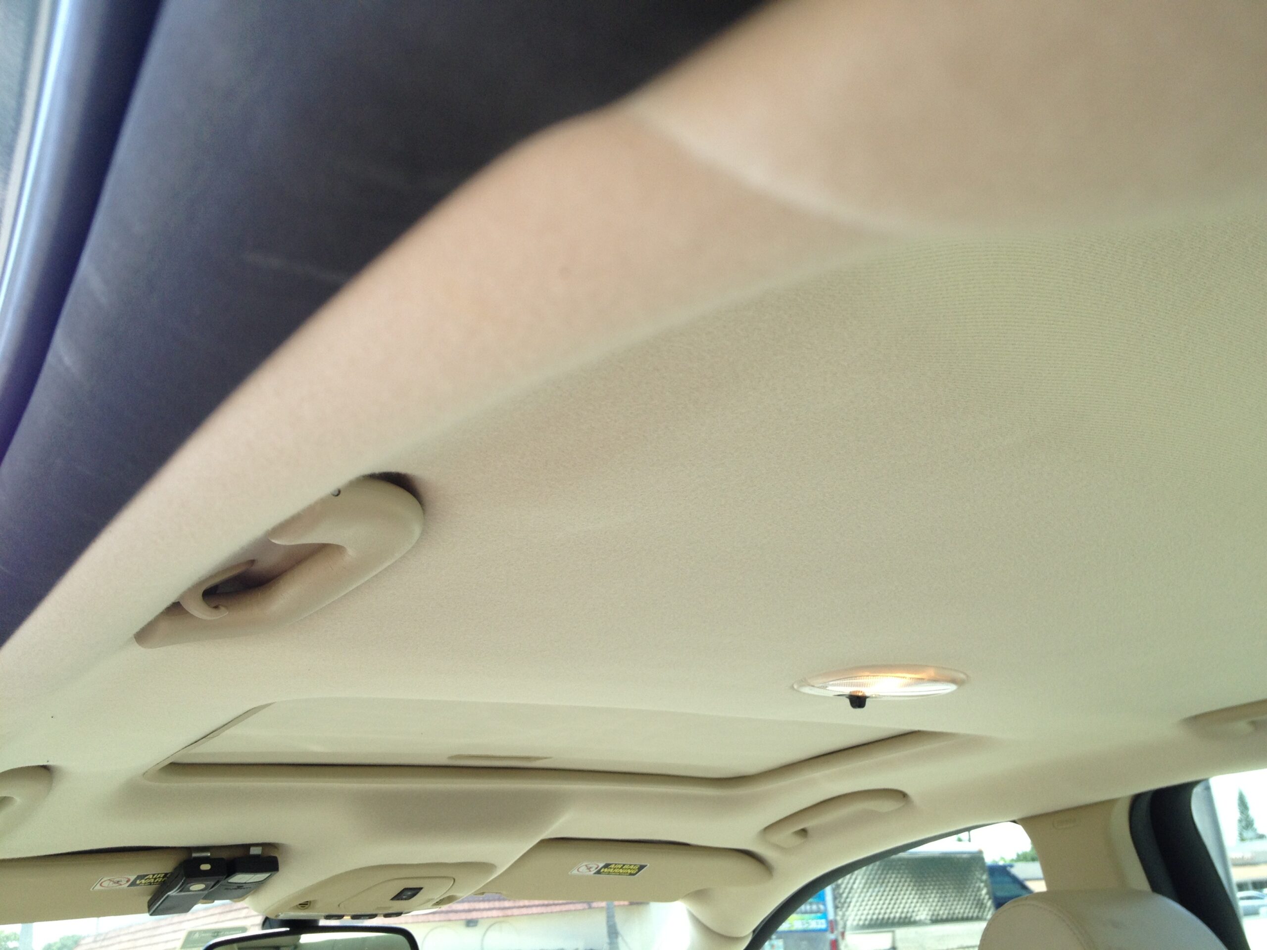 Auto Headliner Repair by Chair Care Upholstery in Hollywood, Florida